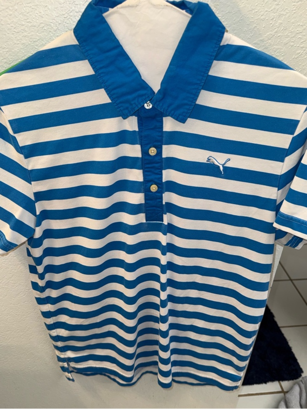 Puma Blue And White Striped Polo Golf Shirt With Multi-Colored Back Size Small